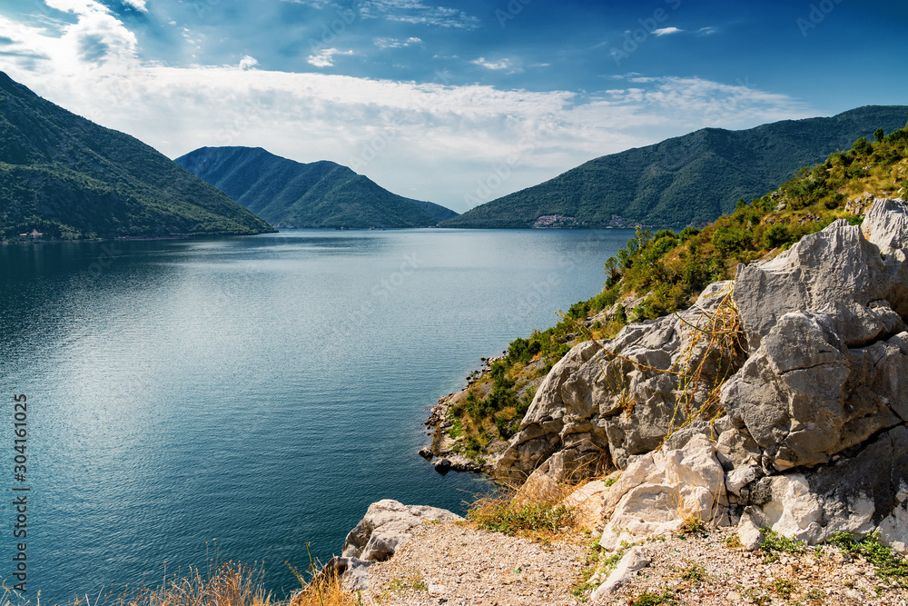 Sunny morning view of the Boka Kotor bay and its islands from above, somewhere near Perast, Montenegro.
