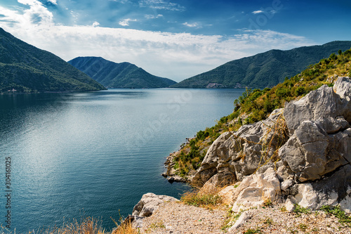 Sunny morning view of the Boka Kotor bay and its islands from above, somewhere near Perast, Montenegro.