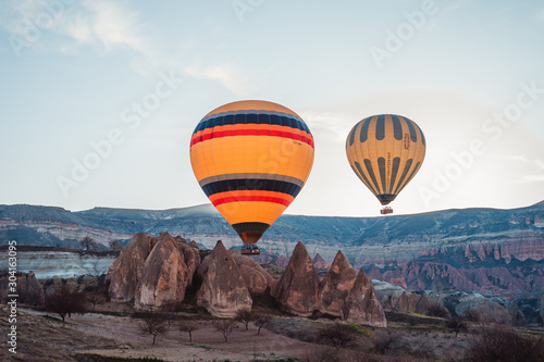 Balloons in Cappadocia at dawn. Beautiful sky, lots of balloons. Texture with copy space