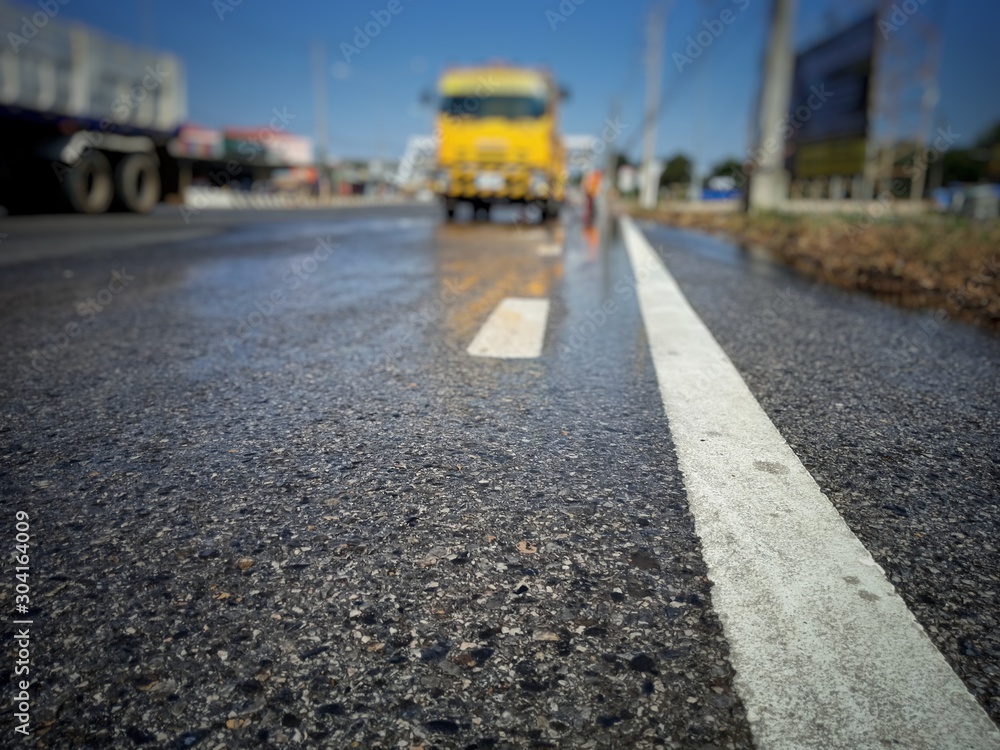 Cleaned road surface From washing and sweeping Cleaned road surface From washing and sweeping