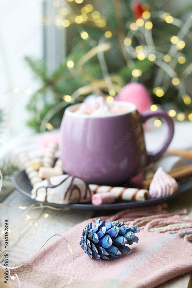 Cup of coffee with meringues and dessert on a plate, Christmas decor, hearts on the windowsill, home comfort concept, winter Cup of coffee with meringues and dessert on a plate, Christmas decor, hearts on the windowsill, home comfort concept, winter