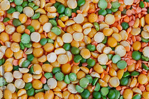 Dried peas and lentils close-up. Background from a mixture of legumes. Bean diet, vegetarianism.