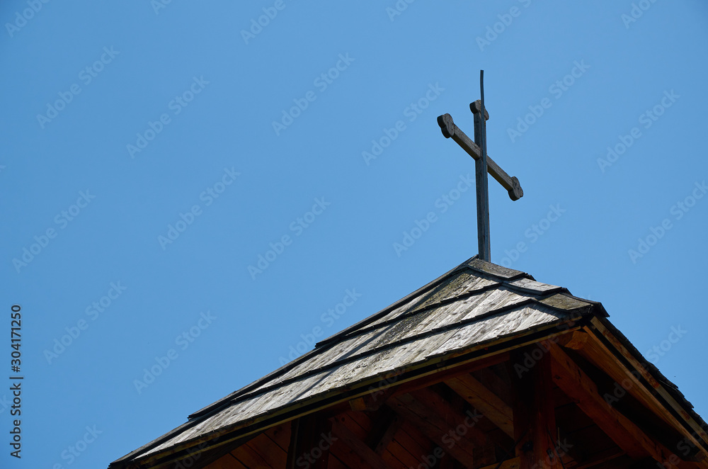 Wooden cross and sky