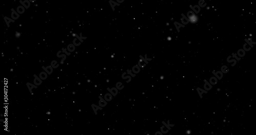 Flying dust particles on a black background