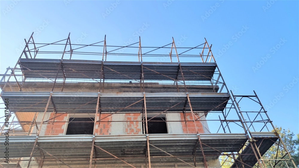 Construction and reconstruction, scaffolding on the building