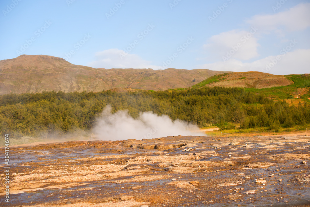 Geysir destrict in the south of Iceland.The Strokkur Geyser erupting at the Haukadalur geothermal area, part of the golden circle, Iceland, Europe Geysir destrict in the south of Iceland.The Strokkur Geyser erupting at the Haukadalur geothermal area, part of the golden circle, Iceland, Europe