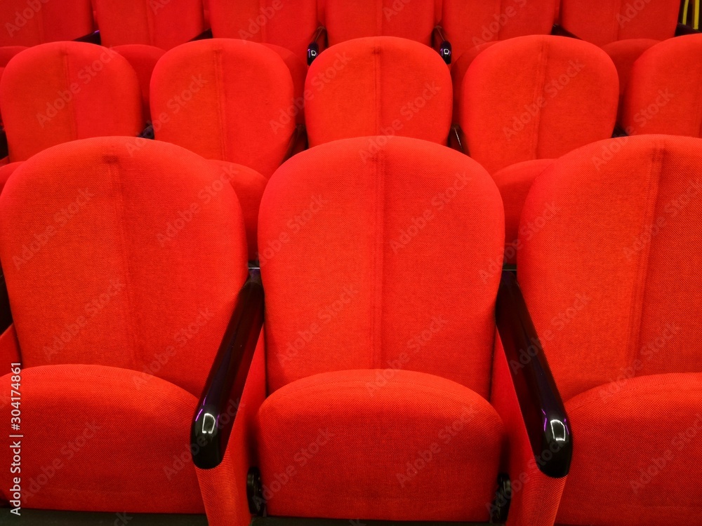 Obraz premium empty auditorium hall with red chairs