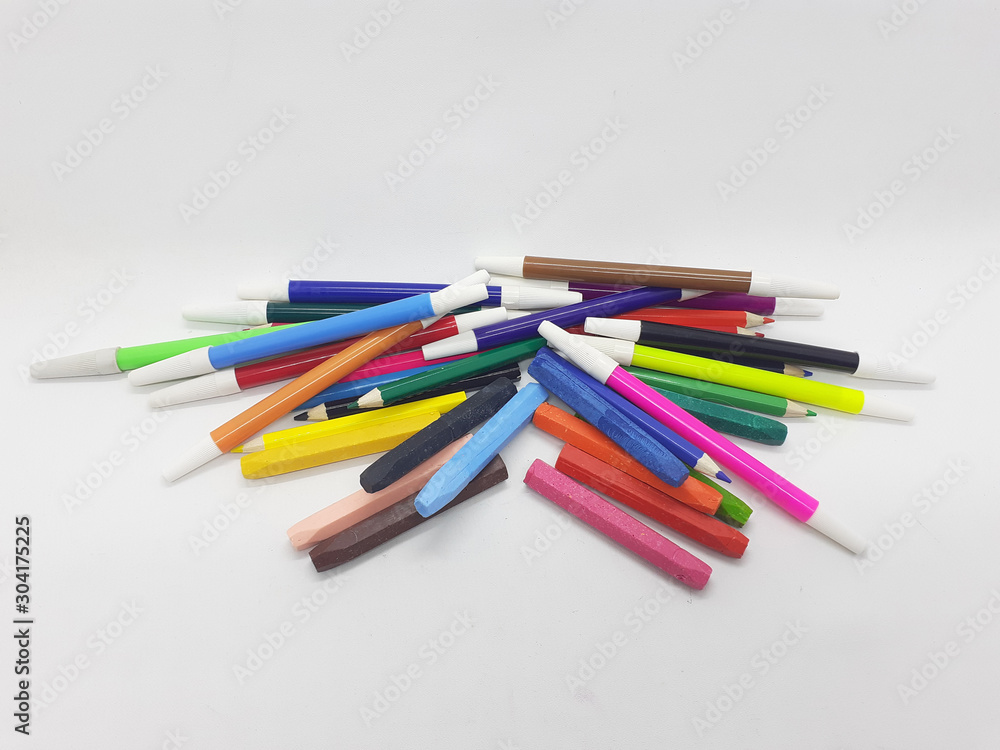 Beautiful Various Colorful Appliances  Pens Crayons Pencils for Coloring and Drawing Tools in White Isolated Background