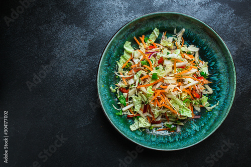 vegetable salad (Chinese cabbage, carrot, onion, lettuce, mix salad) menu concept. food background. top view. copy space