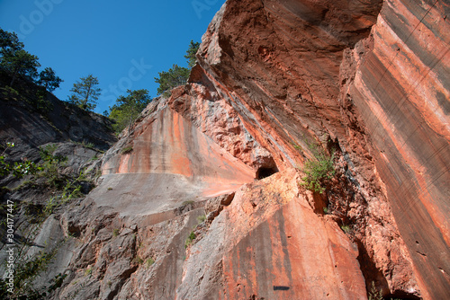 Abandoned quarry with the Engelsberger Red Marble in the eastern alps near Winzendorf in Austria. photo