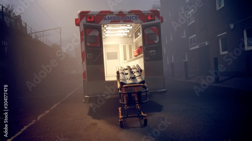 An empty ambulance with stretchers standing in the fog in the middle of the road