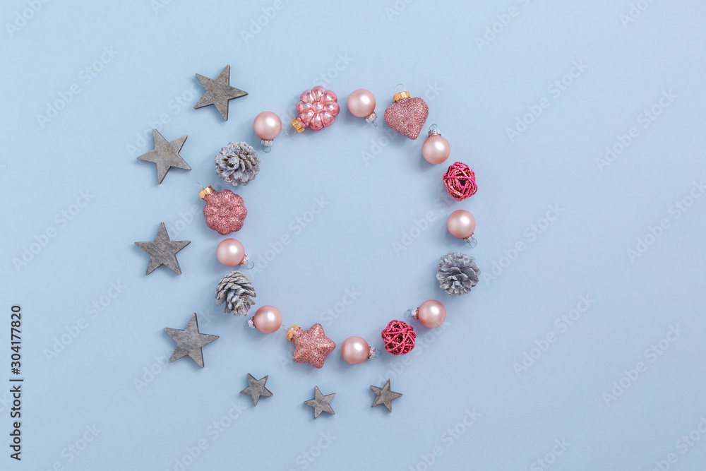 Christmas round frame from Natural cones and pink glass balls, Flat Lay