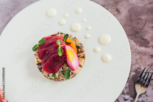 Ahi tuna sashimi and potato salad photo