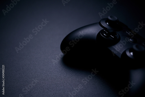video game controller isolated on black background