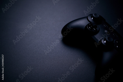 video game controller isolated on black background