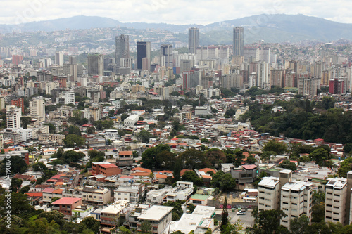 Stunning view of Caracas capital city downtown with main business buildings from majestic El Avila mountain Venezuela © Ellen