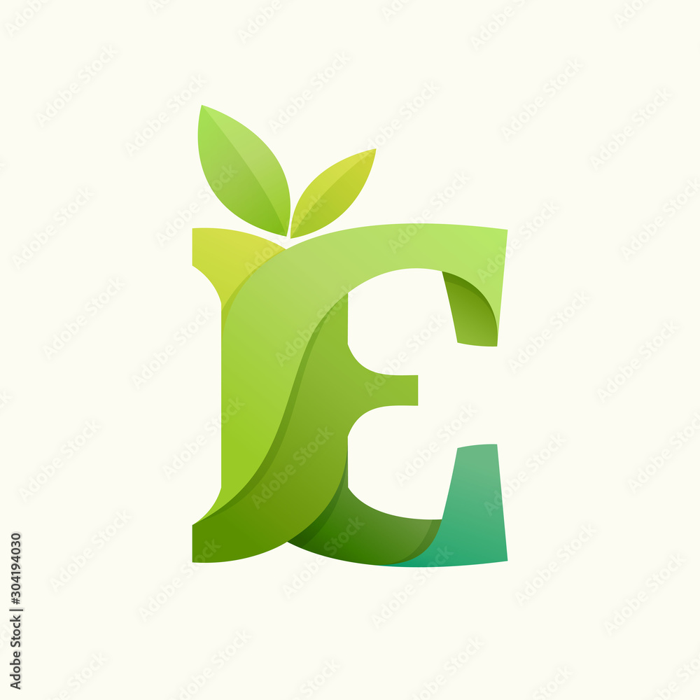 Swirling letter E logo with green leaves.