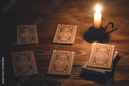 Tarot cards on the table of fortune teller concept.