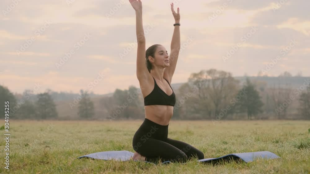 Girl Doing Yoga Exercises Outdoors. Girl Doing Yoga Exercises Outdoors.