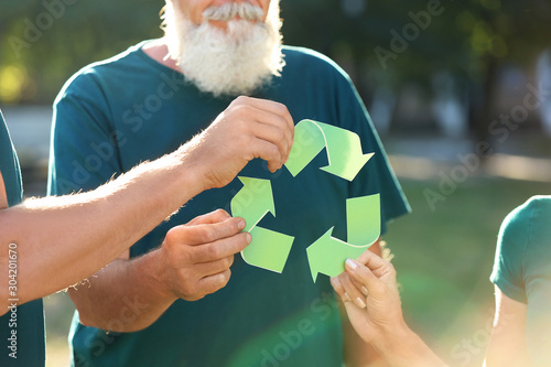 People holding symbol of re...