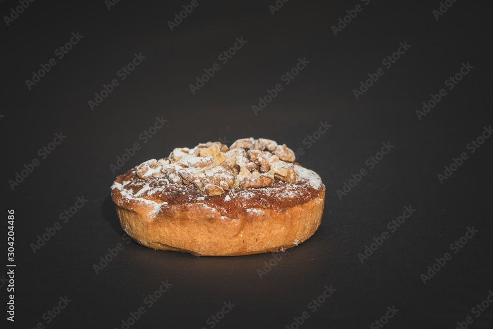 walnut cake on dark background walnut cake on dark background