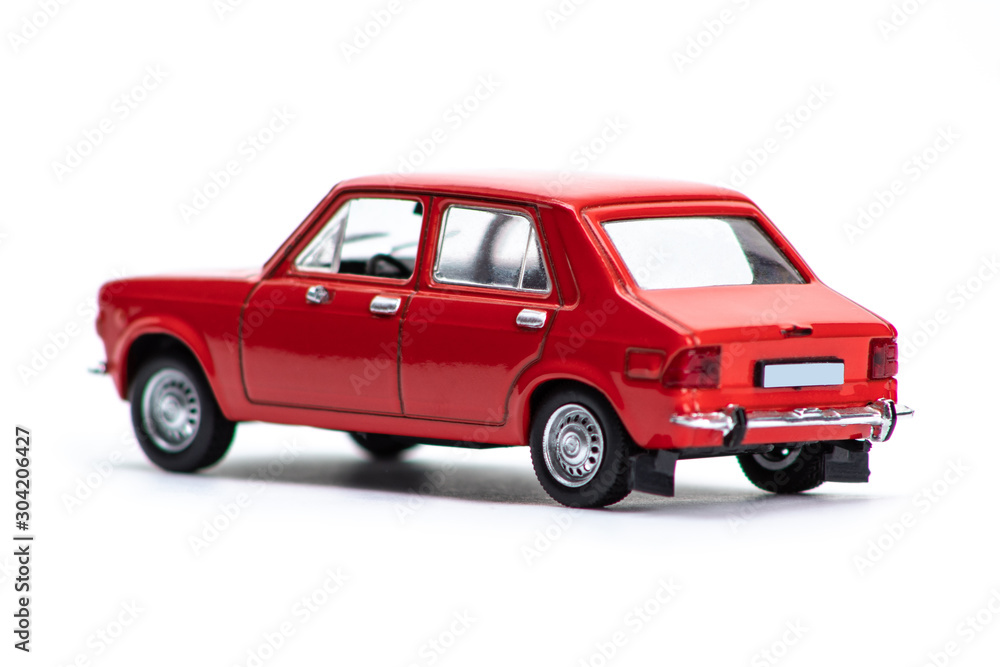 Retro red car isolated on white background.