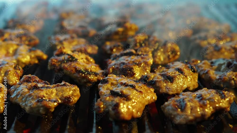 Grilled meat, night party or dinner in the air. Outdoors resyaurant. Grilled meat, night party or dinner in the air. Outdoors resyaurant.