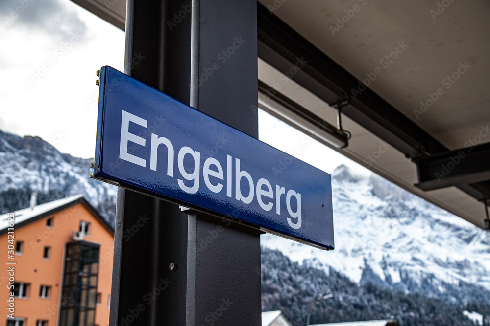 Engelberg - swiss city sign and mountain panorama Engelberg - swiss city sign and mountain panorama