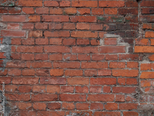 ancient red brick wall texture grunge background with vignetted corners, may use to interior design