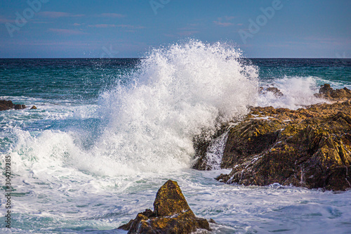 Photography Waves crashing on the rocks