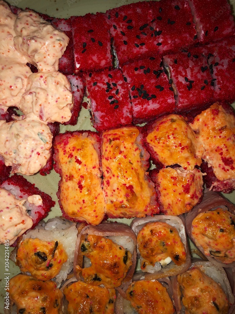 Delicious sushi with bacon and caviar macro Delicious sushi with bacon and caviar macro