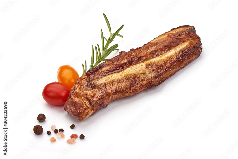 Grilled homemade pork ribs, barbecued meat, isolated on white background Grilled homemade pork ribs, barbecued meat, isolated on white background