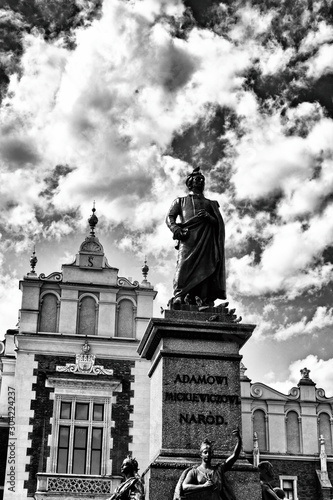  famous monument to the Polish poet Adam Mickiewicz on the market square of the old town in Krakow, Poland
