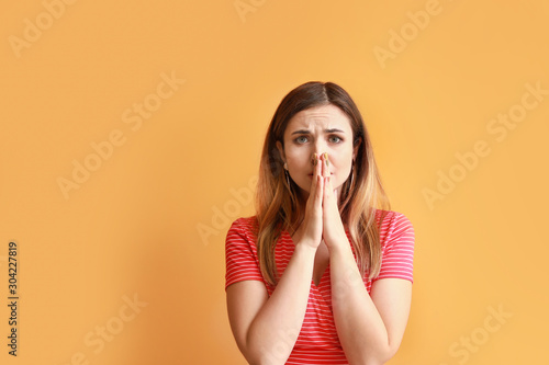 Portrait of worried young w...