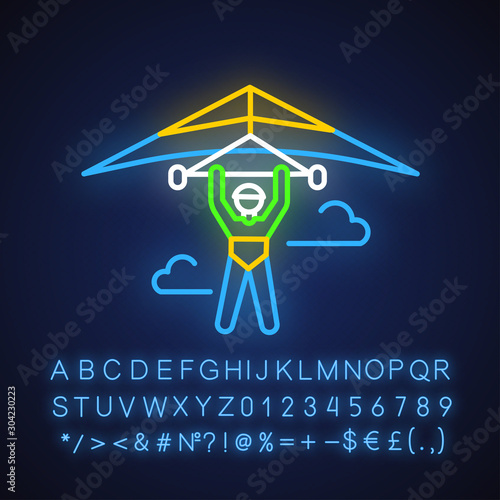 Hang gliding neon light icon. Hangglider pilot flying. Extreme air sport. Skydiving stunt. Adrenaline flights in sky. Paragliding trick. Glowing alphabet, numbers. Vector isolated illustration