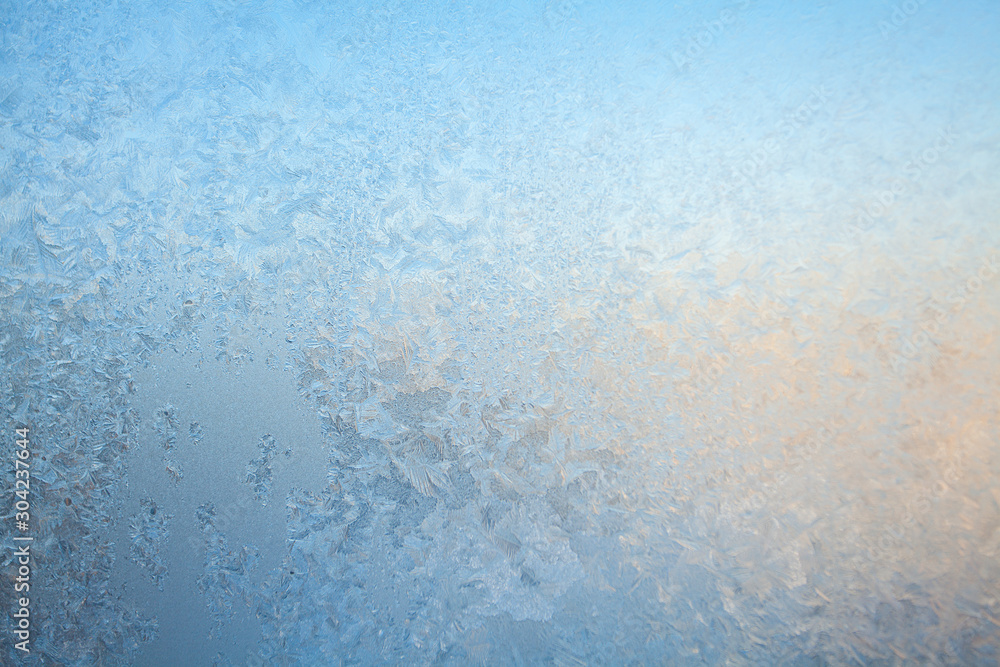 beautiful winter texture patterns of frost on window