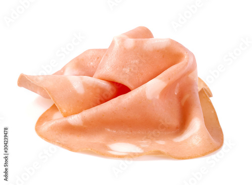 thin slices of mortadella ham isolated on white photo