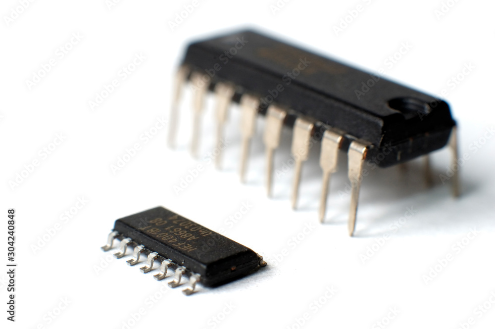 Electronic components SMD in SOIC DIP case lie on top Electronic components SMD in SOIC DIP case lie on top