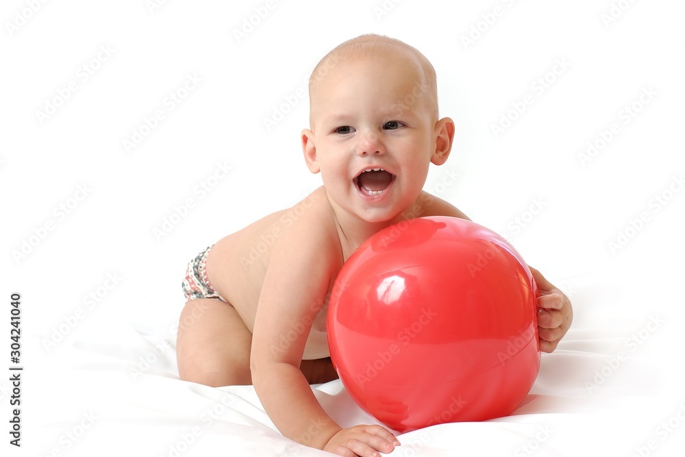 Small plump baby paly the red toy ball Small plump baby paly the red toy ball