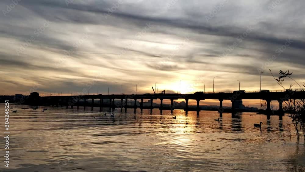 Beautiful landscape view on sunset city bridge over river Beautiful landscape view on sunset city bridge over river