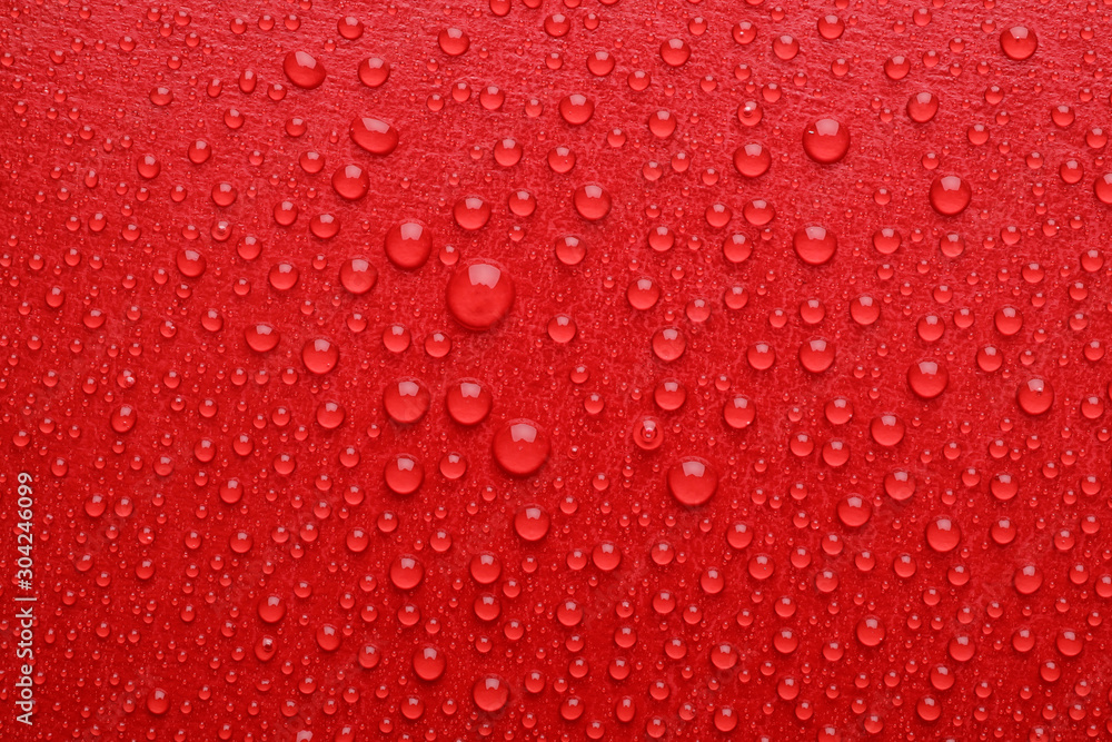 Water drops on red background, top view - obrazy, fototapety, plakaty 