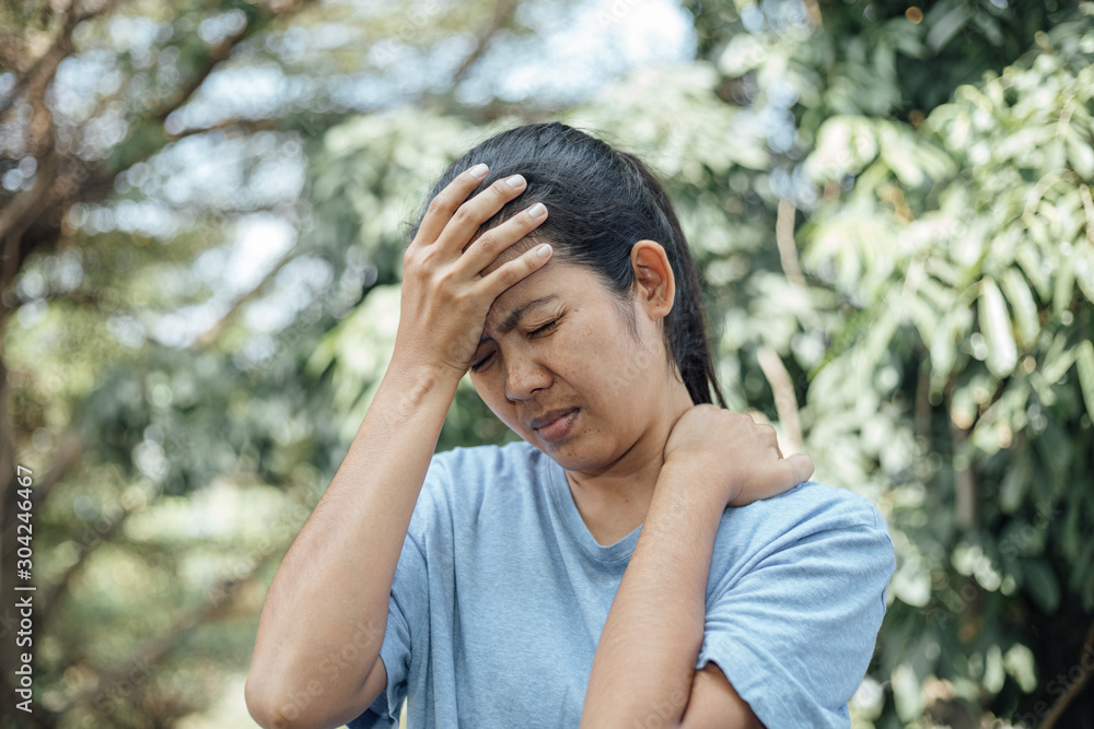 Young asian Woman having headache and strain Young asian Woman having headache and strain