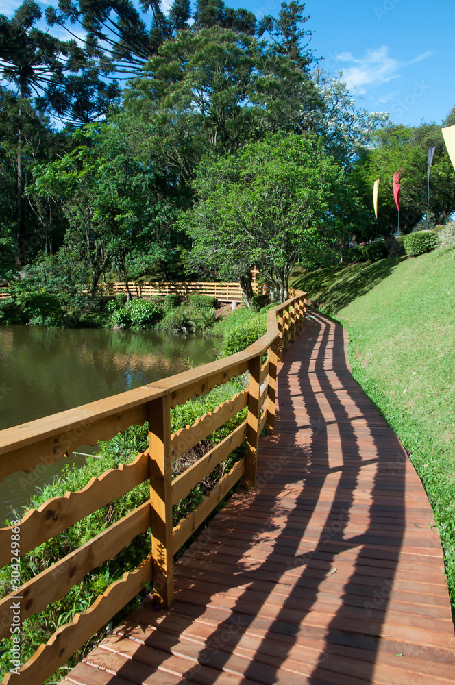 wooden bridge in park wooden bridge in park