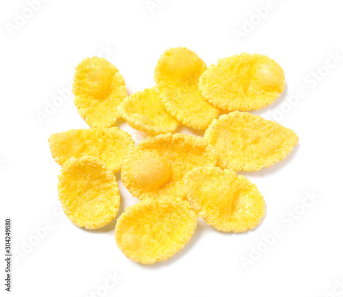 Tasty crispy corn flakes isolated on white, top view