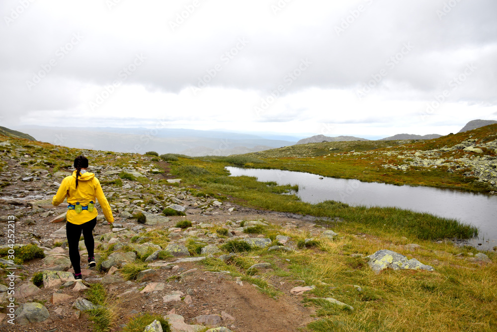 Hiker Making Her Way Down from Mt. Gausta (Gaustatoppen), Norway