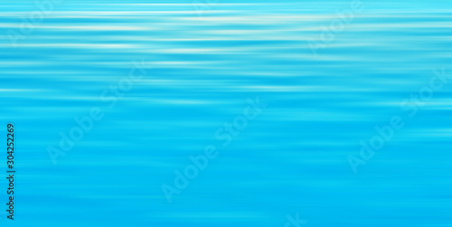 Blue blurred abstract background of water