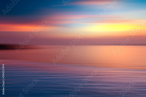 Motion blurred background of refraction in the sea