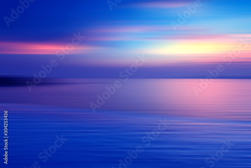 Motion blurred background of refraction in the sea © opasstudio