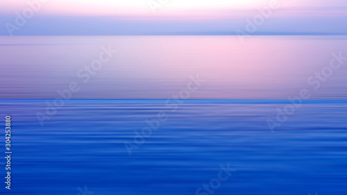 Motion blurred background of refraction in the sea