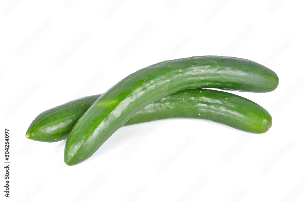 uncooked whole fresh Japanese cucumbers on white background uncooked whole fresh Japanese cucumbers on white background